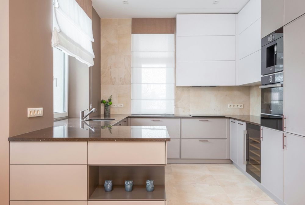 a brown and white modern kitchen